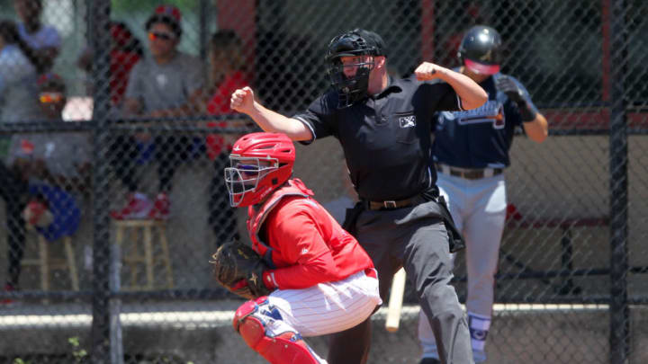 Clearwater, FL - JUL 05: Home plate umpire Joe Belangia calls a third strike for an out during the Gulf Coast League (GCL) game between the GCL Braves and the GCL Phillies East on July 05, 2018, at the Carpenter Complex in Clearwater, FL. (Photo by Cliff Welch/Icon Sportswire via Getty Images)