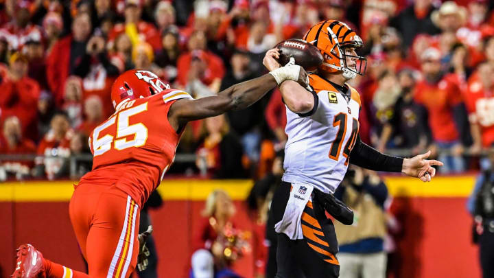 KANSAS CITY, MO – OCTOBER 21: Dee Ford #55 of the Kansas City Chiefs begins to knock the ball loose and sack Andy Dalton #14 of the Cincinnati Bengals during the first quarter of the game at Arrowhead Stadium on October 21, 2018 in Kansas City, Kansas. (Photo by David Eulitt/Getty Images)