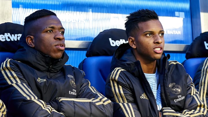 VITORIA-GASTEIZ, SPAIN – NOVEMBER 30: Rodrygo and Vinicius Junior of Real Madrid CF looks on from the bench prior to the Liga match between Deportivo Alaves and Real Madrid CF at Estadio de Mendizorroza on November 30, 2019 in Vitoria-Gasteiz, Spain. (Photo by Quality Sport Images/Getty Images)