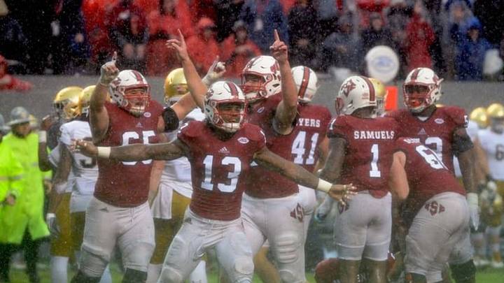 Oct 8, 2016; Raleigh, NC, USA; North Carolina State Wolfpack players celebrate a win against the Notre Dame Fighting Irish at Carter Finley Stadium. The Wolfpack won 10-3. Mandatory Credit: Rob Kinnan-USA TODAY Sports Oct 8, 2016; Raleigh, NC, USA; North Carolina State Wolfpack players celebrate a win against the Notre Dame Fighting Irish at Carter Finley Stadium. The Wolfpack won 10-3. Mandatory Credit: Rob Kinnan-USA TODAY Sports
