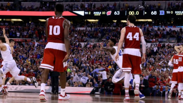 INDIANAPOLIS, IN – APRIL 06: Amile Jefferson #21 of the Duke Blue Devils celebrates with teammates after defeating the Wisconsin Badgers as Nigel Hayes #10, Frank Kaminsky #44 and Bronson Koenig #24 look on during the NCAA Men’s Final Four National Championship at Lucas Oil Stadium on April 6, 2015 in Indianapolis, Indiana. Duke defeated Wisconsin 68-63. (Photo by Streeter Lecka/Getty Images)