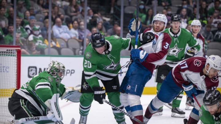 Oct 7, 2021; Dallas, Texas, USA; Dallas Stars goaltender Anton Khudobin (35) and defenseman Ryan Suter (20) defends against Colorado Avalanche left wing J.T. Compher (37) during the third period at the American Airlines Center. Mandatory Credit: Jerome Miron-USA TODAY Sports