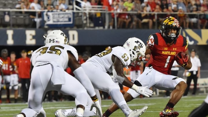 Sep 9, 2016; Miami, FL, USA; Maryland Terrapins wide receiver D.J. Moore (1) rushes the ball against the FIU Golden Panthers during the first half at FIU Stadium. Mandatory Credit: Jasen Vinlove-USA TODAY Sports