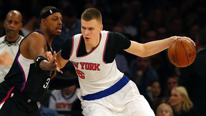 Jan 22, 2016; New York, NY, USA; Los Angeles Clippers forward Paul Pierce (34) defends against New York Knicks forward Kristaps Porzingis (6) during first half at Madison Square Garden. Mandatory Credit: Noah K. Murray-USA TODAY Sports