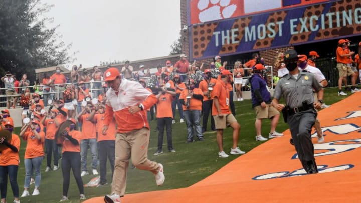 Clemson head coach Dabo Swinney leads his team running down the hill before the game with The Citadel Saturday, Sept. 19, 2020 at Memorial Stadium in Clemson, S.C.(Ken Ruinard / Greenville News )Clemson The Citadel Ncaa Football