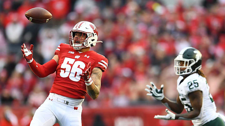 MADISON, WISCONSIN – OCTOBER 12: Zack Baun #56 of the Wisconsin Badgers intercepts a pass intended for Darrell Stewart Jr. #25 of the Michigan State Spartans during the second half of a game at Camp Randall Stadium on October 12, 2019 in Madison, Wisconsin. (Photo by Stacy Revere/Getty Images)