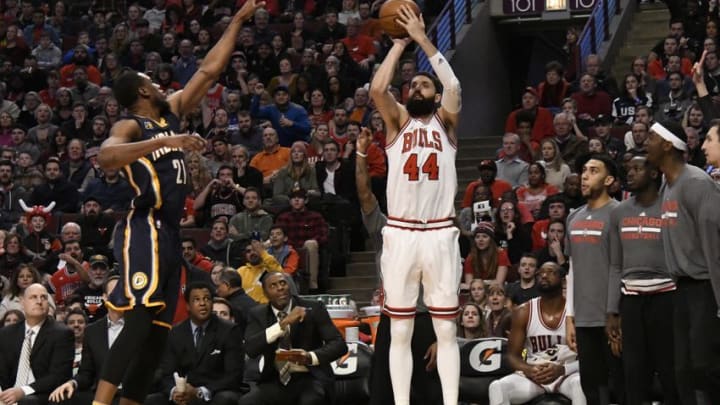 Dec 26, 2016; Chicago, IL, USA; Chicago Bulls forward Nikola Mirotic (44) shoots over Indiana Pacers forward Thaddeus Young (21) during the first half at the United Center. Mandatory Credit: David Banks-USA TODAY Sports