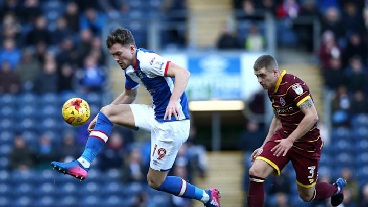 BLACKBURN, ENGLAND - FEBRUARY 04: Sam Gallagher of Blackburn Rovers controls the ball from Jake Bidwell of Queens Park Rangers during the Sky Bet Championship match between Blackburn Rovers and Queens Park Rangers at Ewood Park on February 4, 2017 in Blackburn, England. (Photo by Jan Kruger/Getty Images)