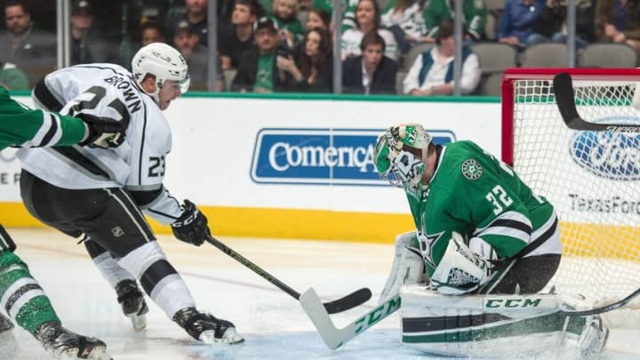 Mar 15, 2016; Dallas, TX, USA; Los Angeles Kings right wing Dustin Brown (23) scores a goal against Dallas Stars goalie Kari Lehtonen (32) during the second period at the American Airlines Center. Mandatory Credit: Jerome Miron-USA TODAY Sports