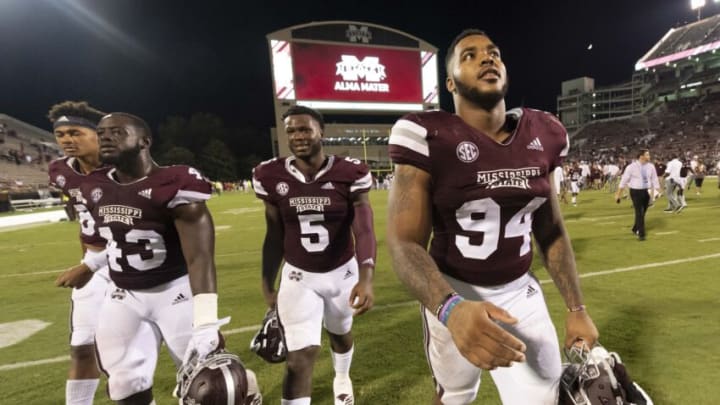 Sep 15, 2018; Starkville, MS, USA; Mississippi State Bulldogs wide receiver Osirus Mitchell (87), and defensive linemen Fletcher Adams (43), Chauncey Rivers (5) and Jeffery Simmons (94) walk off the field to celebrate with fans after the game against the UL Lafayette Ragin' Cajuns at Davis Wade Stadium. Mandatory Credit: Vasha Hunt-USA TODAY Sports