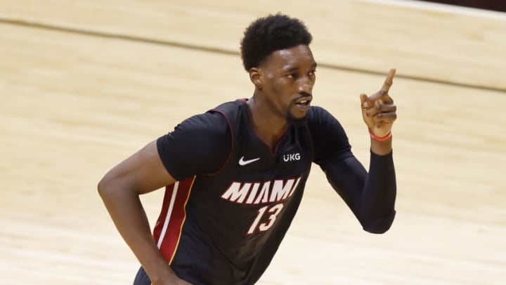 Bam Adebayo (13) of the Miami Heat reacts against the Charlotte Hornets (Photo by Michael Reaves/Getty Images)