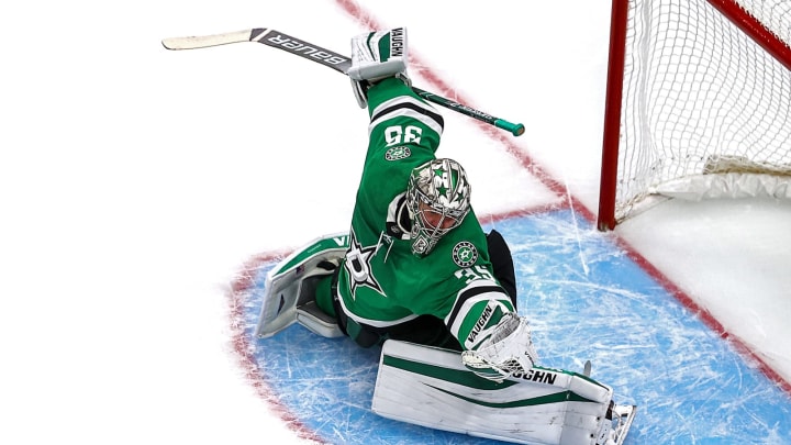 Anton Khudobin makes a glove save for the Dallas Stars (Photo by Bruce Bennett/Getty Images)