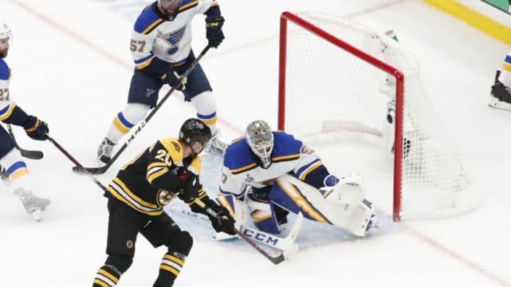 BOSTON, MA - MAY 29: Boston Bruins left wing Joakim Nordstrom (20) slips the puck under St. Louis Blues goalie Jordan Binnington (50) to score during Game 2 of the 2019 Stanley Cup Finals between the Boston Bruins and the St. Louis Blues on May 29, 2019, at TD Garden in Boston, Massachusetts. (Photo by Fred Kfoury III/Icon Sportswire via Getty Images)