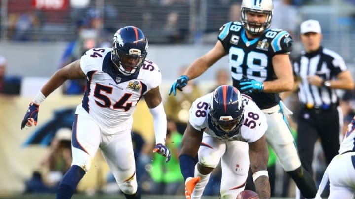 Feb 7, 2016; Santa Clara, CA, USA; Denver Broncos linebacker Von Miller (58) and linebacker Brandon Marshall (54) go for a loose ball against the Carolina Panthers in Super Bowl 50 at Levi