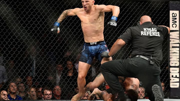 NEW YORK, NY - NOVEMBER 04: TJ Dillashawfights Cody Garbrandt in their UFC bantamweight championship bout during the UFC 217 event at Madison Square Garden on November 4, 2017 in New York City. (Photo by Jeff Bottari/Zuffa LLC/Zuffa LLC via Getty Images)