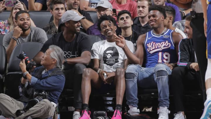 SACRAMENTO, CA - JULY 1: Harrison Barnes #40, De'Aaron Fox #5, Buddy Hield #24 of the Sacramento Kings attend the game against the Golden State Warriors on July 1, 2019 at the Golden 1 Center, in Phoenix, Arizona. NOTE TO USER: User expressly acknowledges and agrees that, by downloading and or using this photograph, User is consenting to the terms and conditions of the Getty Images License Agreement. Mandatory Copyright Notice: Copyright 2019 NBAE (Photo by Rocky Widner/NBAE via Getty Images)