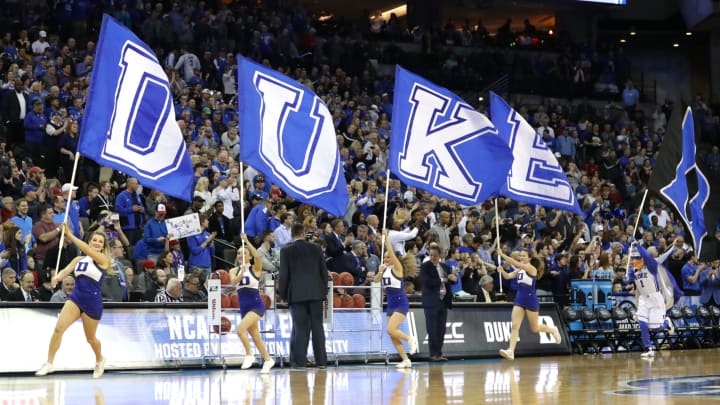 OMAHA, NE – MARCH 25: The Duke Blue Devils cheerleaders carry their schools flags on to the court prior to the 2018 NCAA Men’s Basketball Tournament Midwest Regional against the Kansas Jayhawks at CenturyLink Center on March 25, 2018 in Omaha, Nebraska. (Photo by Streeter Lecka/Getty Images)