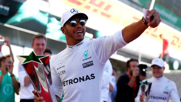 MONZA, ITALY - SEPTEMBER 03: Race winner Lewis Hamilton of Great Britain and Mercedes GP celebrates during the Formula One Grand Prix of Italy at Autodromo di Monza on September 3, 2017 in Monza, Italy. (Photo by Dan Istitene/Getty Images)