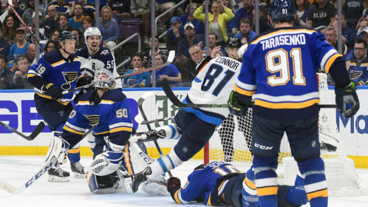 ST. LOUIS, MO - APRIL 16: St. Louis Blues goalie Jordan Binnington (50) reacts as Winnipeg Jets leftwing Kyle Connor (81) scores the winning goal in overtime during a first round Stanley Cup Playoffs game between the Winnipeg Jets and the St. Louis Blues, on April 16, 2019, at Enterprise Center, St. Louis, Mo. (Photo by Keith Gillett/Icon Sportswire via Getty Images)