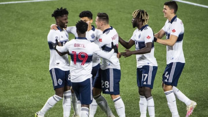 Oct 24, 2020; Portland, Oregon, USA; Vancouver Whitecaps forward Tosaint Ricketts (87) celebrates with teammates during the second half after scoring a goal against the San Jose Earthquakes at Providence Park. The Vancouver Whitecaps won the game 2-1. Mandatory Credit: Troy Wayrynen-USA TODAY Sportsd