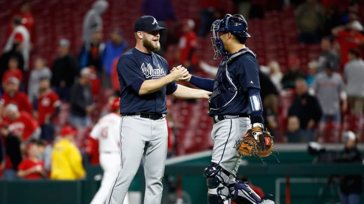 CINCINNATI, OH – APRIL 25: A.J. Minter #33 and Kurt Suzuki #24 of the Atlanta Braves celebrate after the 5-4 win against the Cincinnati Reds at Great American Ball Park on April 25, 2018 in Cincinnati, Ohio. (Photo by Andy Lyons/Getty Images)