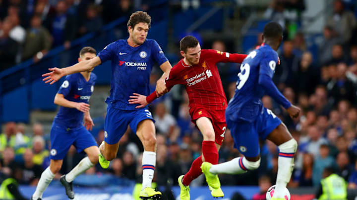 LONDON, ENGLAND - SEPTEMBER 22: Andrew Robertson of Liverpool battles for the ball with Marcos Alonso of Chelsea during the Premier League match between Chelsea FC and Liverpool FC at Stamford Bridge on September 22, 2019 in London, United Kingdom. (Photo by Dan Istitene/Getty Images)