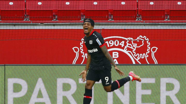 Leverkusen's Jamaican midfielder Leon Bailey celebrates scoring the opening goal during the German first division Bundesliga football match between Bayer 04 Leverkusen and Eintracht Frankfurt in Leverkusen, western Germany, on April 24, 2021. - DFL REGULATIONS PROHIBIT ANY USE OF PHOTOGRAPHS AS IMAGE SEQUENCES AND/OR QUASI-VIDEO (Photo by THILO SCHMUELGEN / POOL / AFP) / DFL REGULATIONS PROHIBIT ANY USE OF PHOTOGRAPHS AS IMAGE SEQUENCES AND/OR QUASI-VIDEO (Photo by THILO SCHMUELGEN/POOL/AFP via Getty Images)