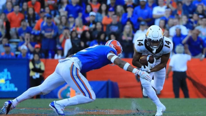 GAINESVILLE, FL - NOVEMBER 03:Dominic Gicinto #14 of the Missouri Tigers rushes against Brad Stewart Jr. #2 of the Florida Gators during the game at Ben Hill Griffin Stadium on November 3, 2018 in Gainesville, Florida. (Photo by Sam Greenwood/Getty Images)