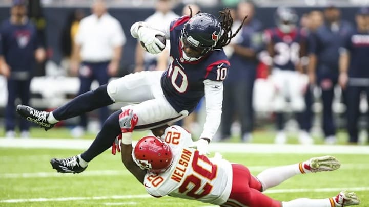 Sep 18, 2016; Houston, TX, USA; Houston Texans wide receiver DeAndre Hopkins (10) makes a reception as Kansas City Chiefs cornerback Steven Nelson (20) attempts to make a tackle during the third quarter at NRG Stadium. The Texans won 19-12. Mandatory Credit: Troy Taormina-USA TODAY Sports