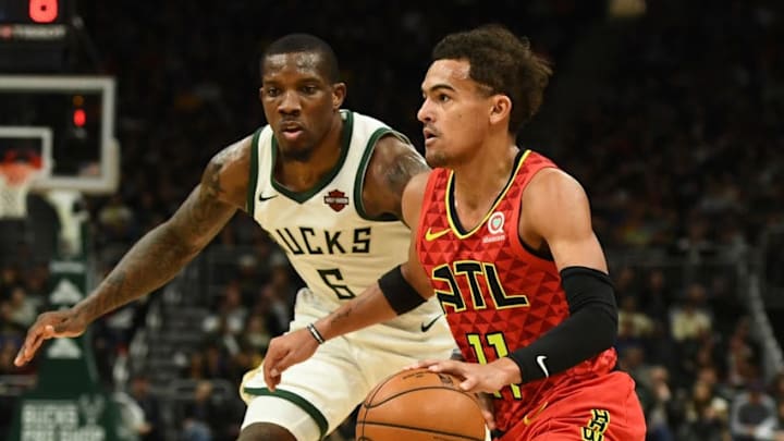 MILWAUKEE, WISCONSIN - NOVEMBER 27: Trae Young #11 of the Atlanta Hawks is defended by Eric Bledsoe #6 of the Milwaukee Bucks during a game at Fiserv Forum on November 27, 2019 in Milwaukee, Wisconsin. NOTE TO USER: User expressly acknowledges and agrees that, by downloading and or using this photograph, User is consenting to the terms and conditions of the Getty Images License Agreement. (Photo by Stacy Revere/Getty Images)