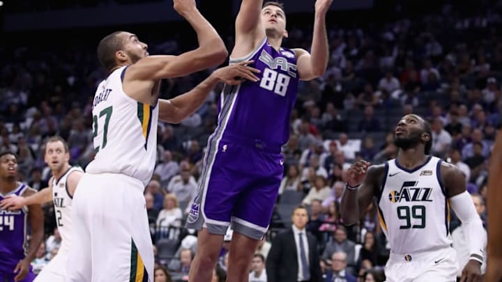 SACRAMENTO, CA - OCTOBER 17: Nemanja Bjelica #88 of the Sacramento Kings goes up for a shot against Rudy Gobert #27 and Jae Crowder #99 of the Utah Jazz at Golden 1 Center on October 17, 2018 in Sacramento, California. NOTE TO USER: User expressly acknowledges and agrees that, by downloading and or using this photograph, User is consenting to the terms and conditions of the Getty Images License Agreement. (Photo by Ezra Shaw/Getty Images)
