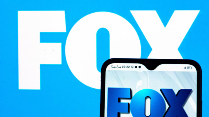UKRAINE - 2021/09/15: In this photo illustration Fox Broadcasting Company logo seen displayed on a smartphone and in the background. (Photo Illustration by Igor Golovniov/SOPA Images/LightRocket via Getty Images)