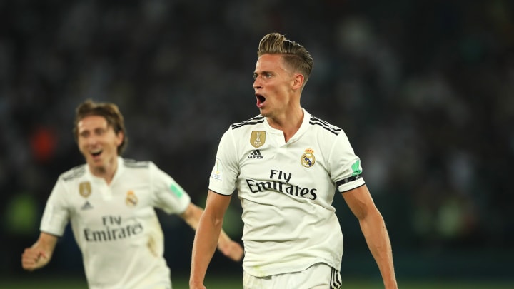 ABU DHABI, UNITED ARAB EMIRATES – DECEMBER 22: Marcos Llorente of Real Madrid celebrates scoring a goal to make it 2-0 during the FIFA Club World Cup UAE final match between Real Madrid and Al Ain at Sheikh Zayed Stadium on December 22, 2018 in Abu Dhabi, United Arab Emirates. (Photo by Matthew Ashton – AMA/Getty Images)