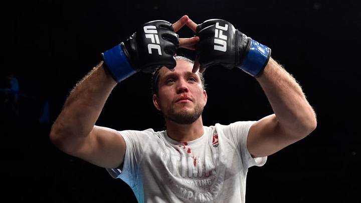 FRESNO, CA - DECEMBER 09: Brian Ortega celebrates his submission victory over Cub Swanson in their featherweight bout during the UFC Fight Night event inside Save Mart Center on December 9, 2017 in Fresno, California. (Photo by Jeff Bottari/Zuffa LLC/Zuffa LLC via Getty Images)