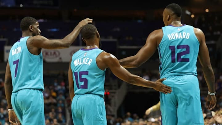 CHARLOTTE, NC - OCTOBER 27: Teammates Dwayne Bacon
