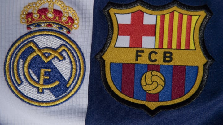 Real Madrid and Barcelona club crests. (Photo by Visionhaus)