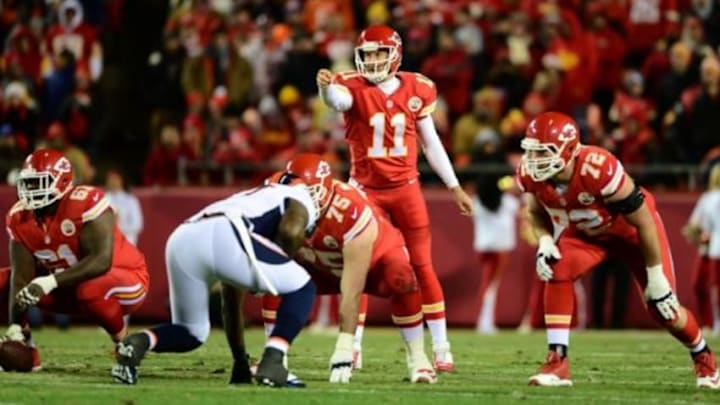 Nov 30, 2014; Kansas City, MO, USA; Kansas City Chiefs quarterback Alex Smith (11) calls out in front of center Rodney Hudson (61) and guard Mike McGlynn (75) and tackle Eric Fisher (72) in the second quarter against the Denver Broncos at Arrowhead Stadium. Mandatory Credit: Ron Chenoy-USA TODAY Sports