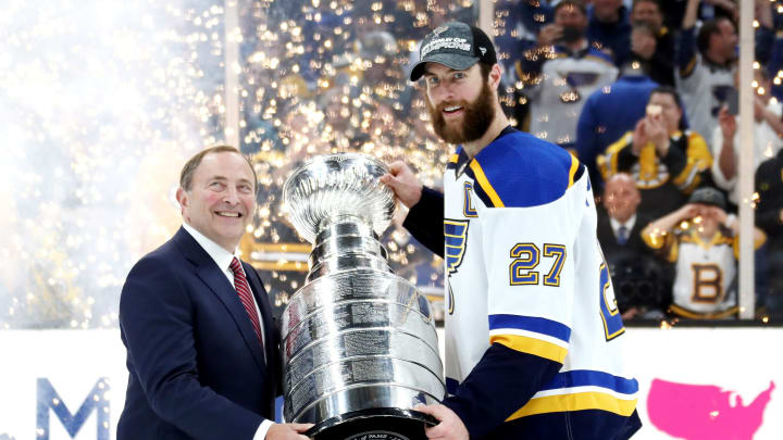 BOSTON, MASSACHUSETTS – JUNE 12: NHL commisoner Gary Bettman presents Alex Pietrangelo. (Photo by Bruce Bennett/Getty Images)