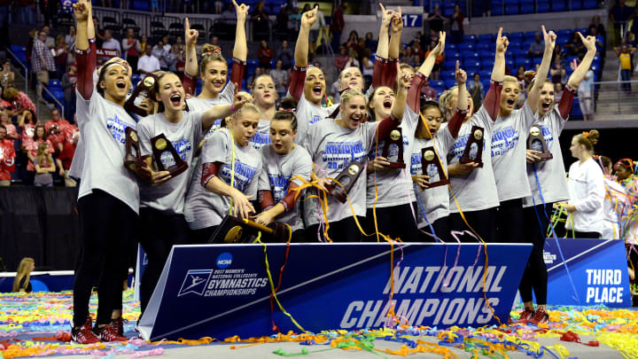 Apr 15, 2017; St. Louis, MO, USA; Oklahoma Sooners gymnastics team celebrates as they drop the trophy after winning the National Championships during the 2017 NCAA Women’s Gymnastics Championships at Chaifetz Arena. Mandatory Credit: Jeff Curry-USA TODAY Sports