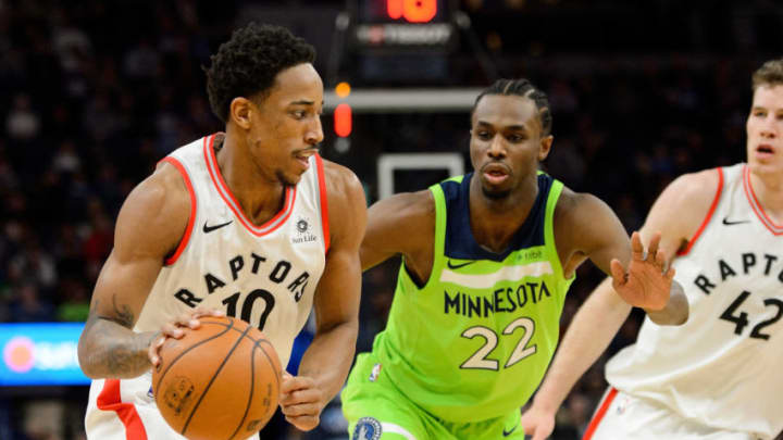 MINNEAPOLIS, MN - JANUARY 20: DeMar DeRozan #10 of the Toronto Raptors drives to the basket against Andrew Wiggins #22 of the Minnesota Timberwolves. (Photo by Hannah Foslien/Getty Images)