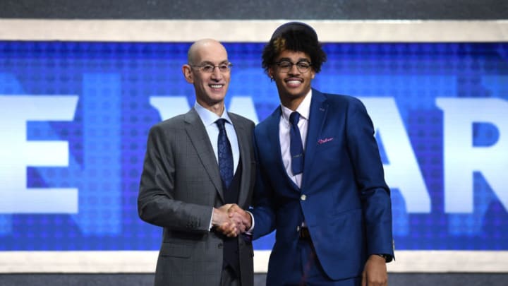 NEW YORK, NEW YORK - JUNE 20: Jordan Poole poses with NBA Commissioner Adam Silver after being drafted with the 28th overall pick by the Golden State Warriors during the 2019 NBA Draft at the Barclays Center on June 20, 2019 in the Brooklyn borough of New York City. NOTE TO USER: User expressly acknowledges and agrees that, by downloading and or using this photograph, User is consenting to the terms and conditions of the Getty Images License Agreement. (Photo by Sarah Stier/Getty Images)