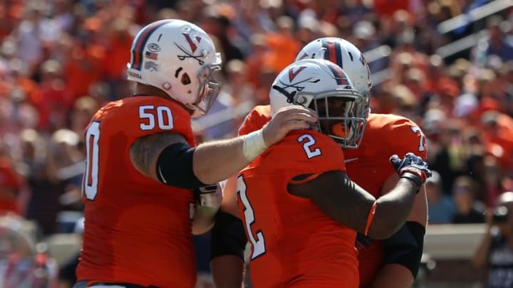 Oct 15, 2016; Charlottesville, VA, USA; Virginia Cavaliers running back Albert Reid (2) celebrates with teammates after scoring a touchdown against the Pittsburgh Panthers in the second quarter at Scott Stadium. Mandatory Credit: Geoff Burke-USA TODAY Sports