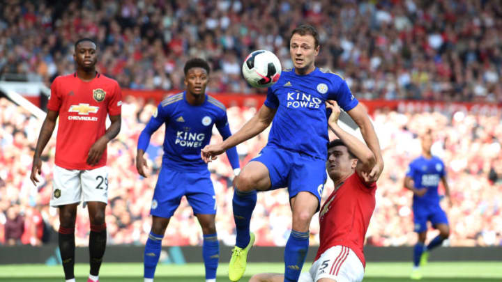 MANCHESTER, ENGLAND - SEPTEMBER 14: Jonny Evans of Leicester City is challenged by Harry Maguire of Manchester United during the Premier League match between Manchester United and Leicester City at Old Trafford on September 14, 2019 in Manchester, United Kingdom. (Photo by Gary Prior/Getty Images)