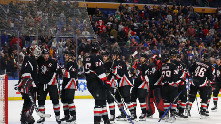 Dec 29, 2022; Buffalo, New York, USA; The Buffalo Sabres celebrate a win over the Detroit Red Wings at KeyBank Center. Mandatory Credit: Timothy T. Ludwig-USA TODAY Sports