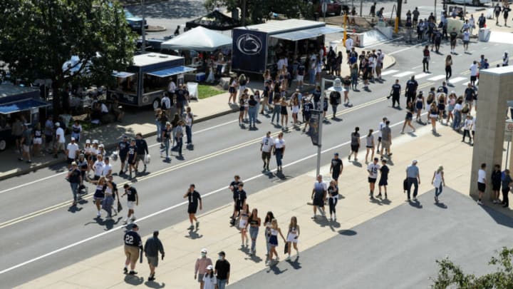 Auburn footballSep 11, 2021; University Park, Pennsylvania, USA; Fans walk in the midway prior to the game between the Ball State Cardinals and the Penn State Nittany Lions at Beaver Stadium. Mandatory Credit: Matthew OHaren-USA TODAY Sports