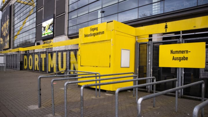 DORTMUND, GERMANY - APRIL 03: A sign marks the way to a coronavirus care facility at the north stand at Signal Iduna Park on April 3, 2020 in Dortmund, Germany. Bundesliga club Borussia Dortmund announced on Friday that they provide the north stand of Germanys largest football stadium for for coronavirus testing and Covid-19 patient care. (Photo by Lars Baron/Getty Images)