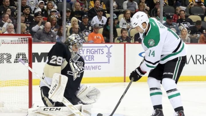 Oct 22, 2015; Pittsburgh, PA, USA; Pittsburgh Penguins goalie Marc-Andre Fleury (29) makes a save against Dallas Stars left wing Jamie Benn (14) during the first period at the CONSOL Energy Center. Mandatory Credit: Charles LeClaire-USA TODAY Sports