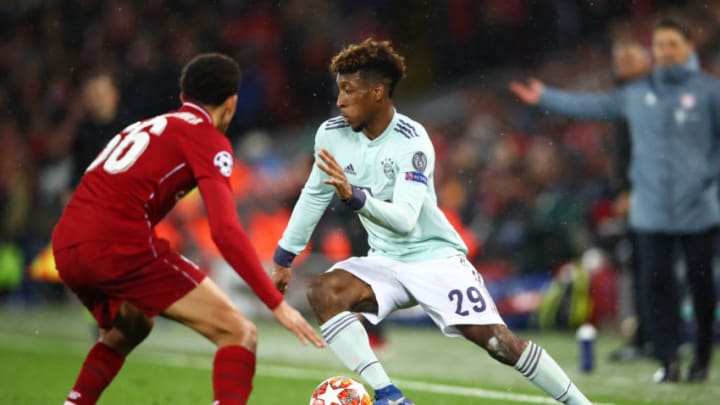 LIVERPOOL, ENGLAND - FEBRUARY 19: Kingsley Coman of Bayern Munich takes on Trent Alexander-Arnold of Liverpool during the UEFA Champions League Round of 16 First Leg match between Liverpool and FC Bayern Muenchen at Anfield on February 19, 2019 in Liverpool, England. (Photo by Clive Brunskill/Getty Images)