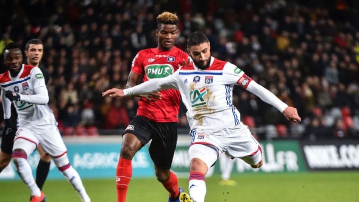 Guingamp's Gabonese midifielder Didier Ndong (C-L) fights for the ball with Lyon's French forward Nabil Fekir (R) during the French Cup round of 16 football match between Guingamp (EAG) and Lyon (OL), on February 7, 2019, at Roudourou Stadium, in Guingamp, western France. (Photo by JEAN-FRANCOIS MONIER / AFP) (Photo credit should read JEAN-FRANCOIS MONIER/AFP/Getty Images)