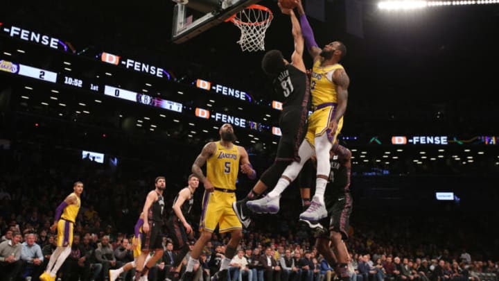Dec 18, 2018; Brooklyn, NY, USA; Brooklyn Nets center Jarrett Allen (31) blocks a shot by Los Angeles Lakers small forward LeBron James (23) during the first quarter at Barclays Center. Mandatory Credit: Brad Penner-USA TODAY Sports